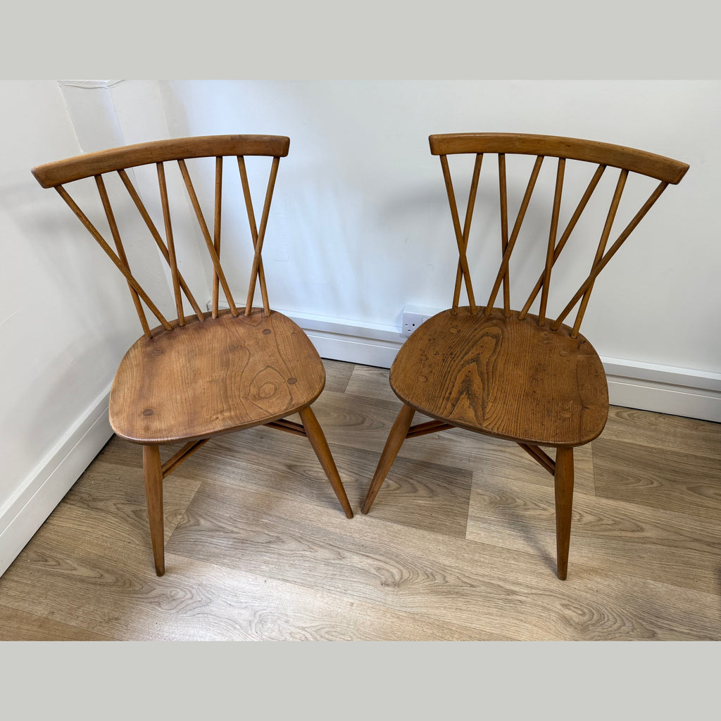 A pair of Vintage Ercol Model 376 Candlestick chairs
