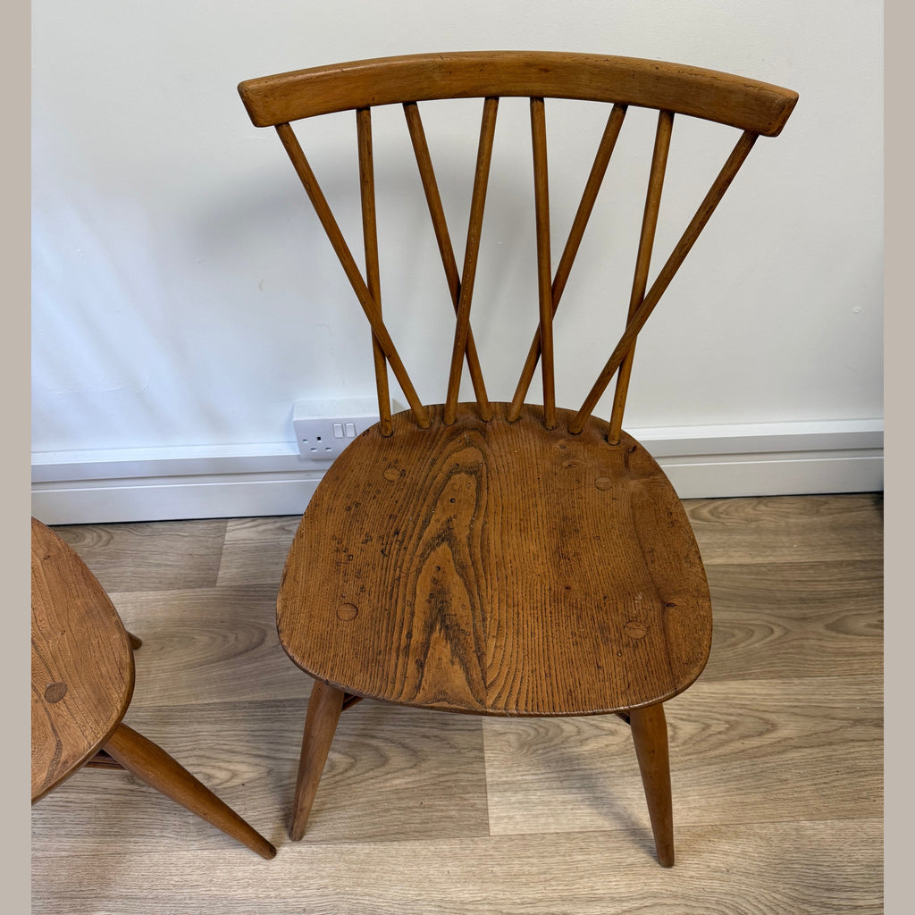 A pair of Vintage Ercol Model 376 Candlestick chairs