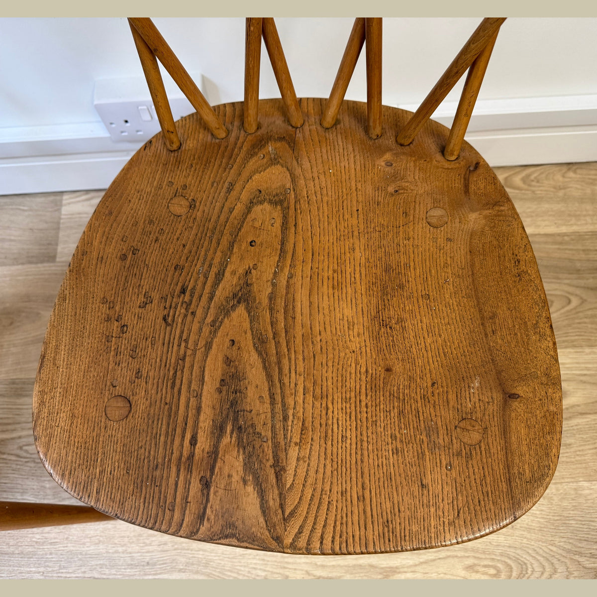 A pair of Vintage Ercol Model 376 Candlestick chairs