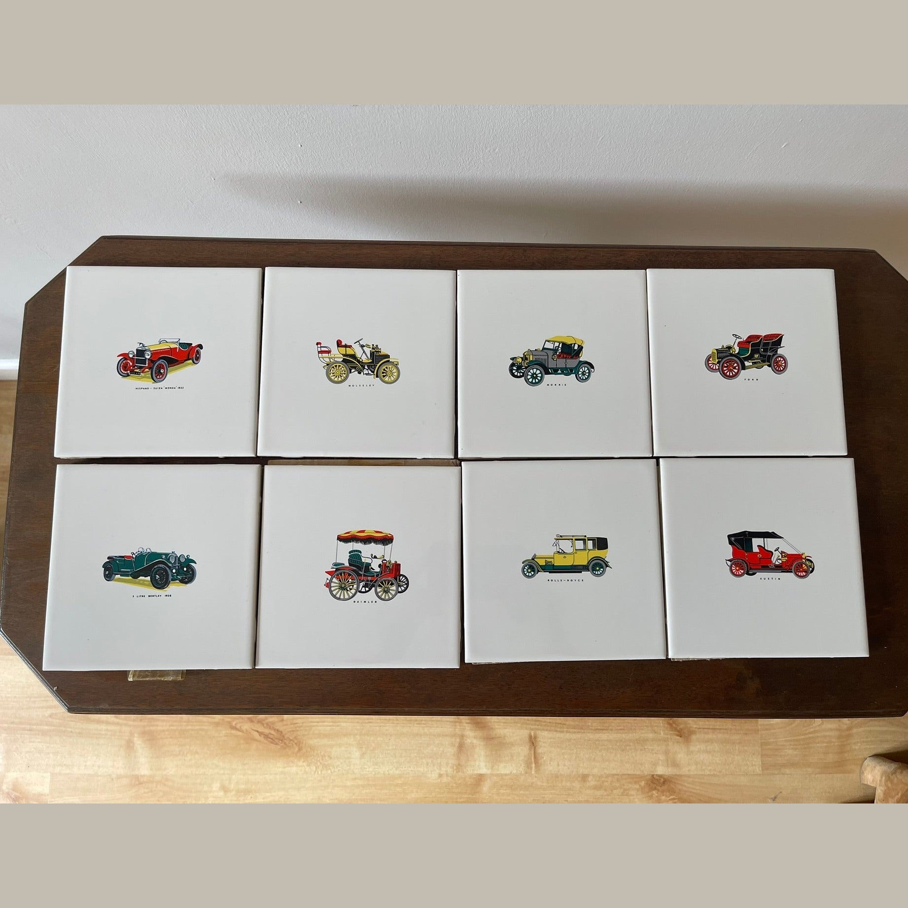 Vintage set of 8 Pilkington carter wall tiles with vintage cars printed on.