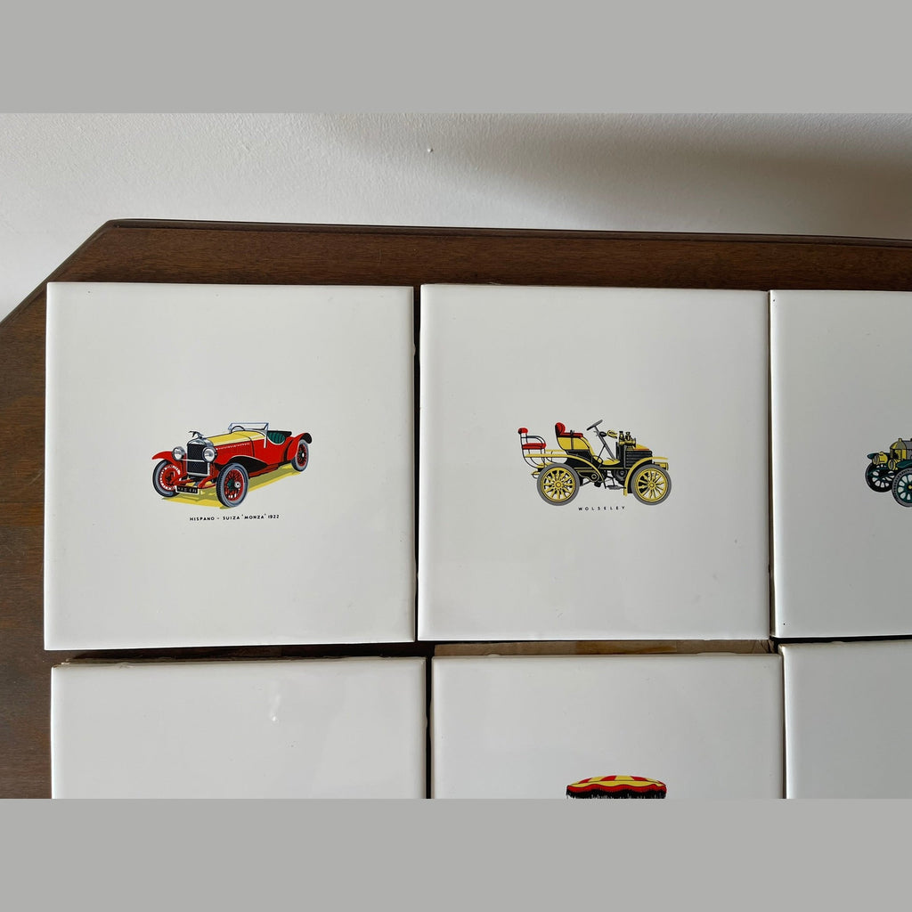 Vintage set of 8 Pilkington carter wall tiles with vintage cars printed on.