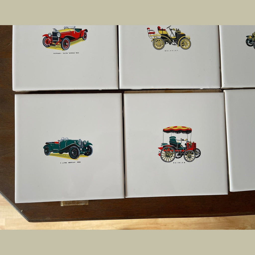 Vintage set of 8 Pilkington carter wall tiles with vintage cars printed on.