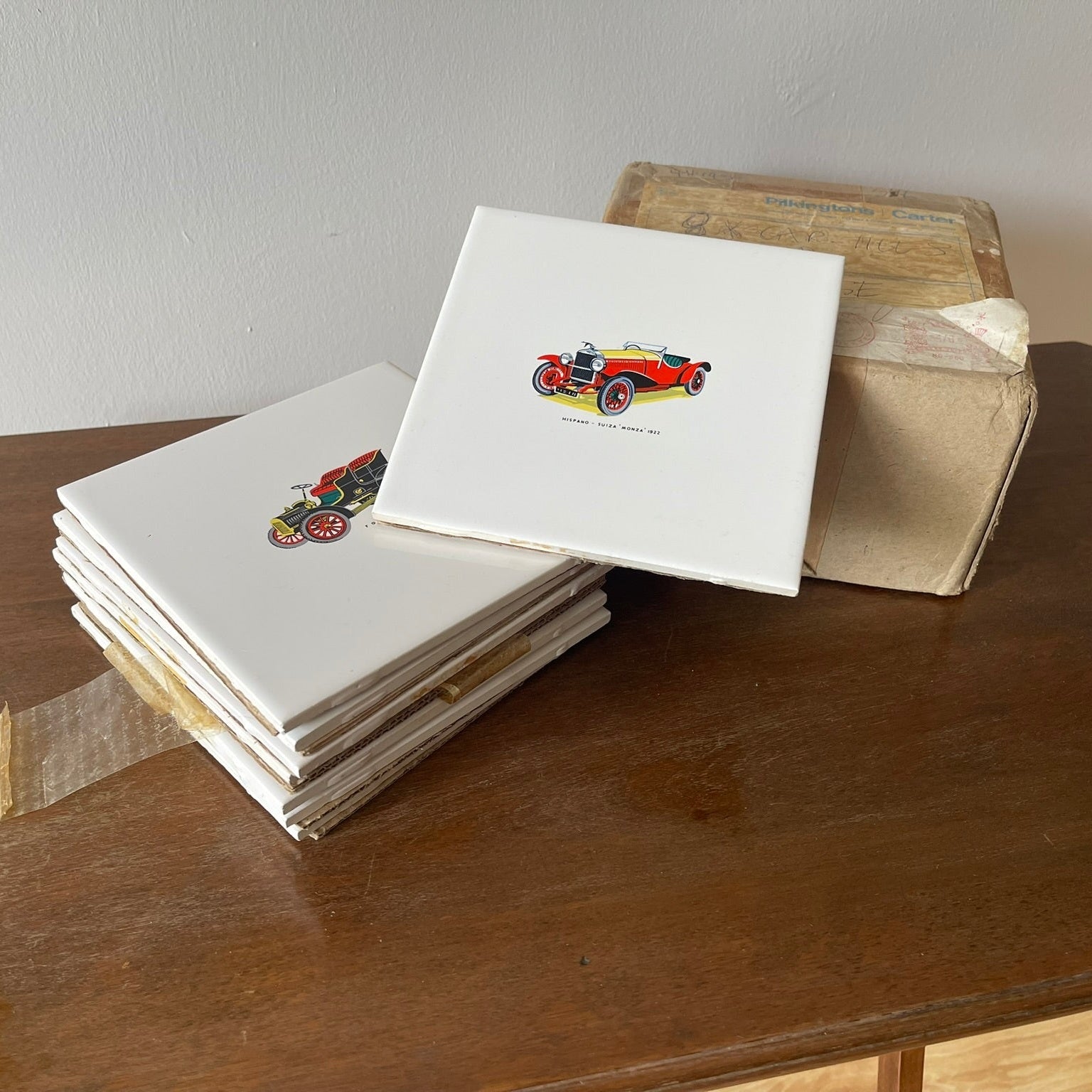 Vintage set of 8 Pilkington carter wall tiles with vintage cars printed on.
