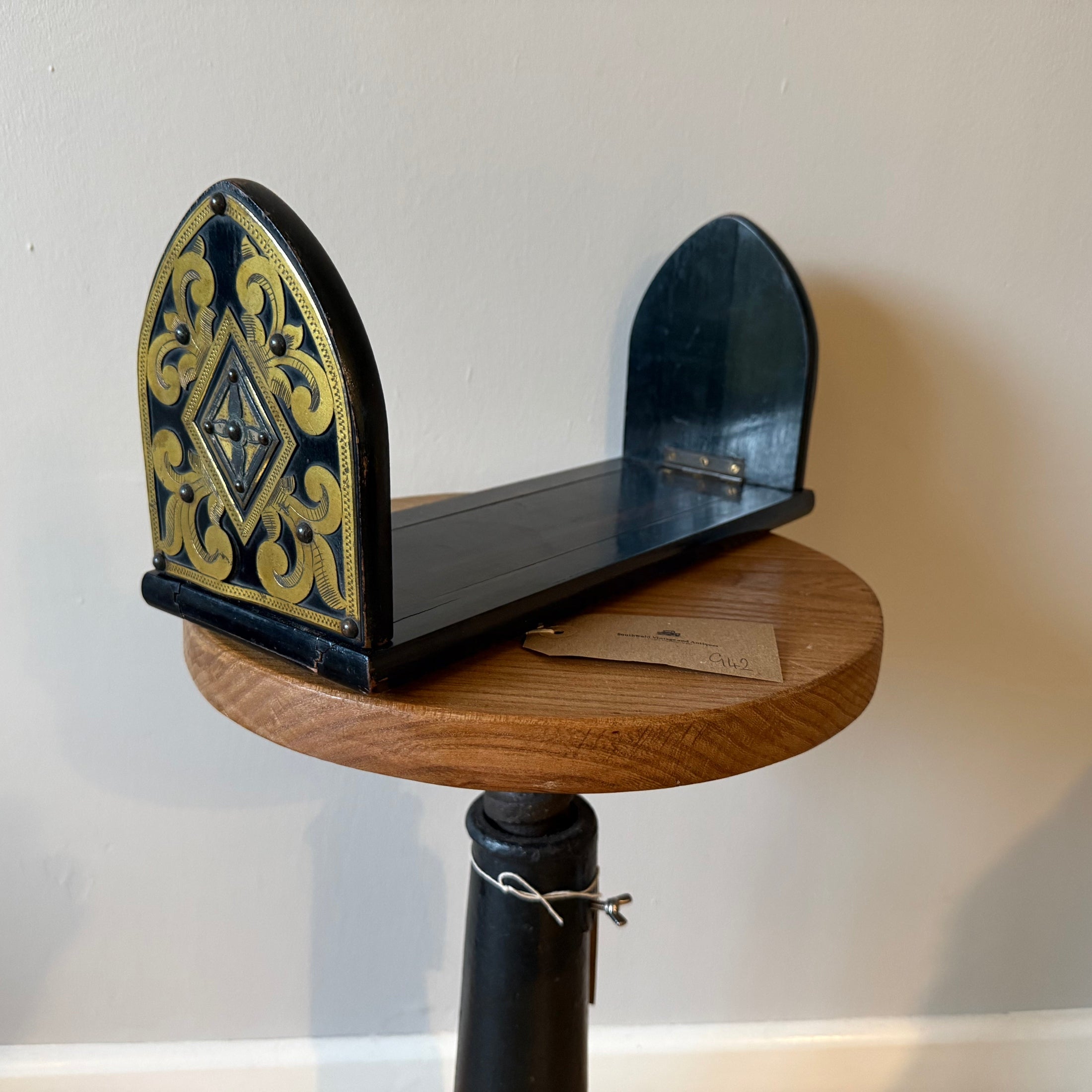 A Victorian brass bound coromandel wood book slides, having pierced brass decoration.