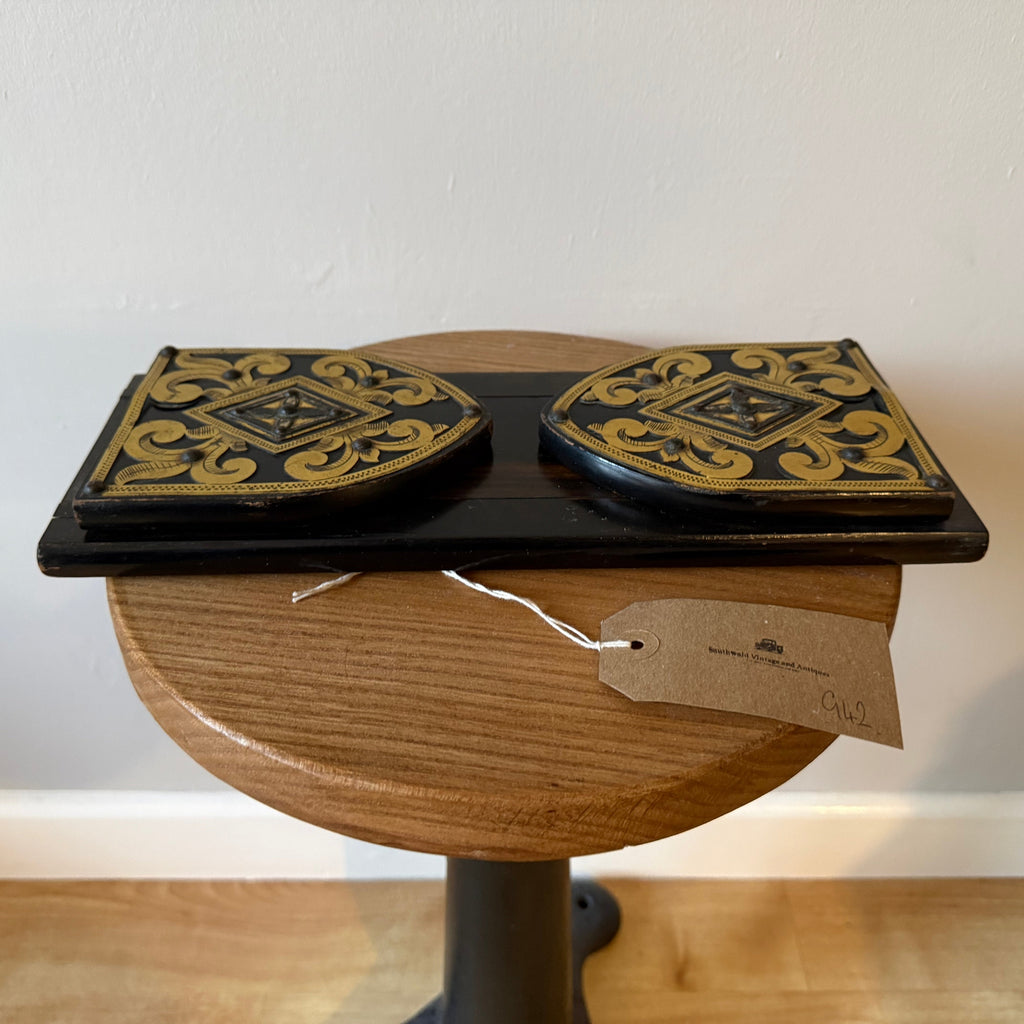 A Victorian brass bound coromandel wood book slides, having pierced brass decoration.