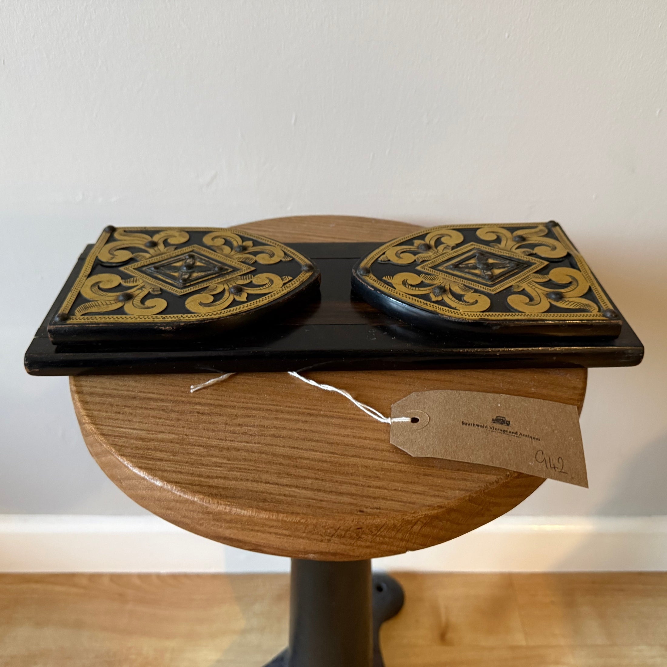 A Victorian brass bound coromandel wood book slides, having pierced brass decoration.