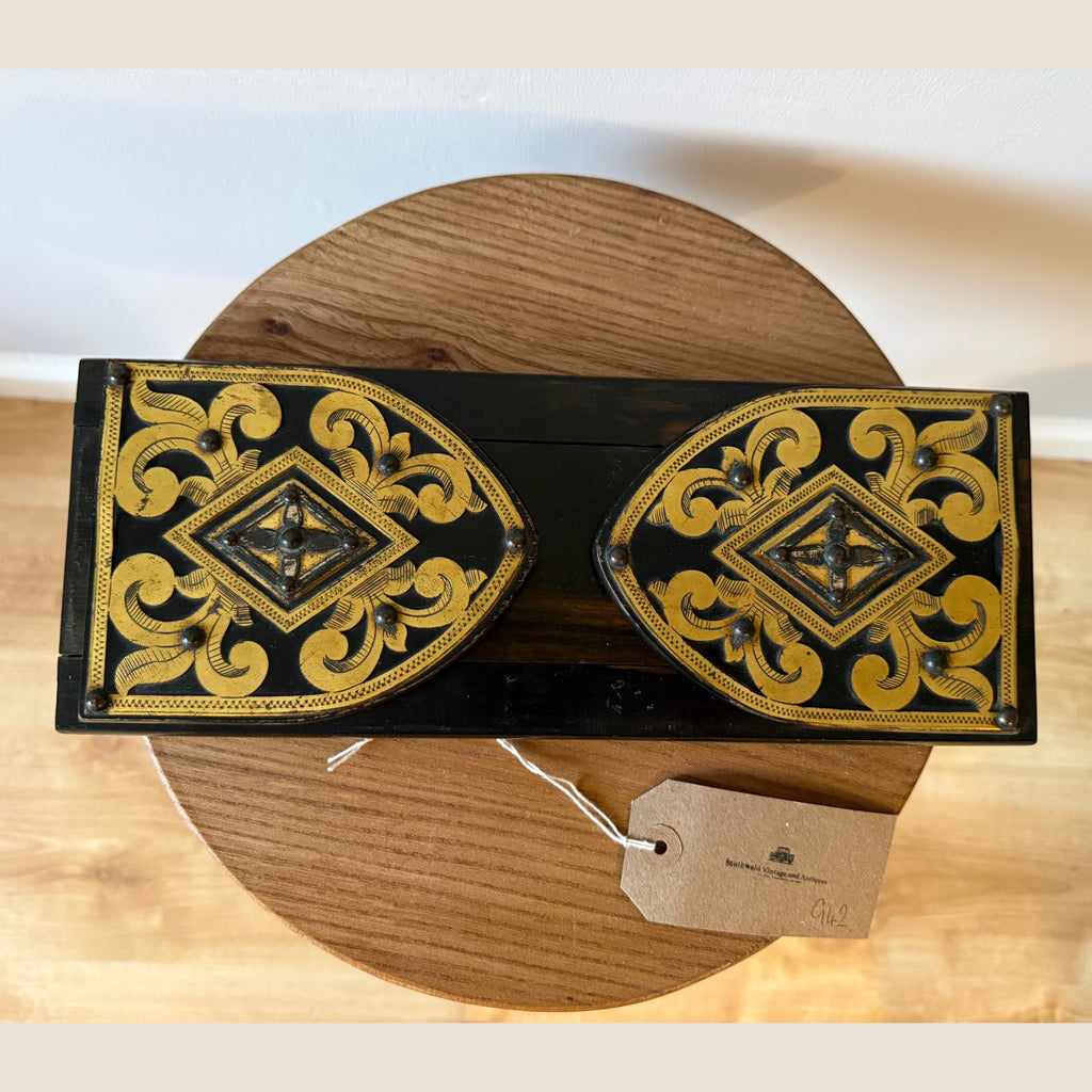 A Victorian brass bound coromandel wood book slides, having pierced brass decoration.