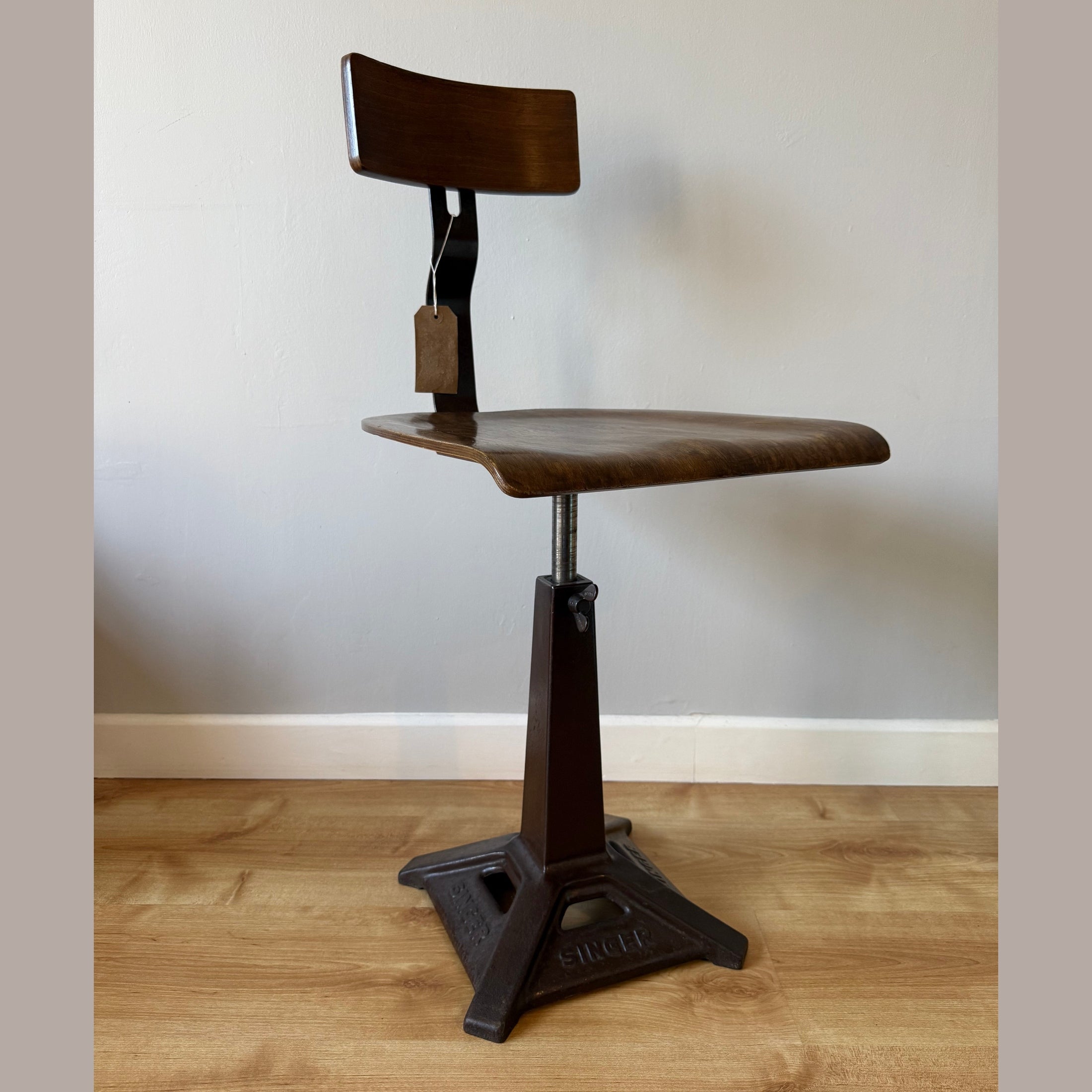 Vintage Singer chair with square base.