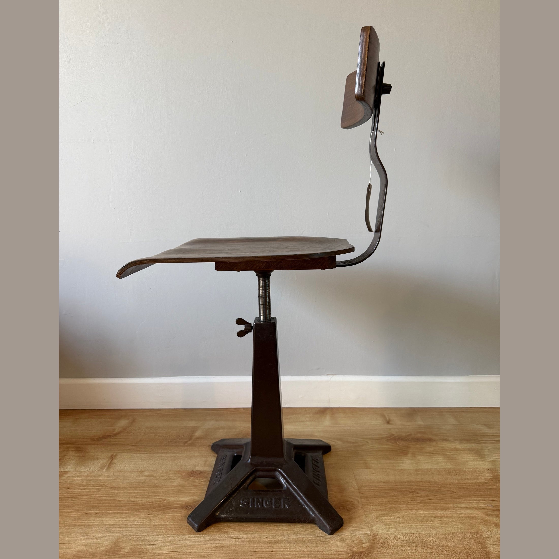 Vintage Singer chair with square base.