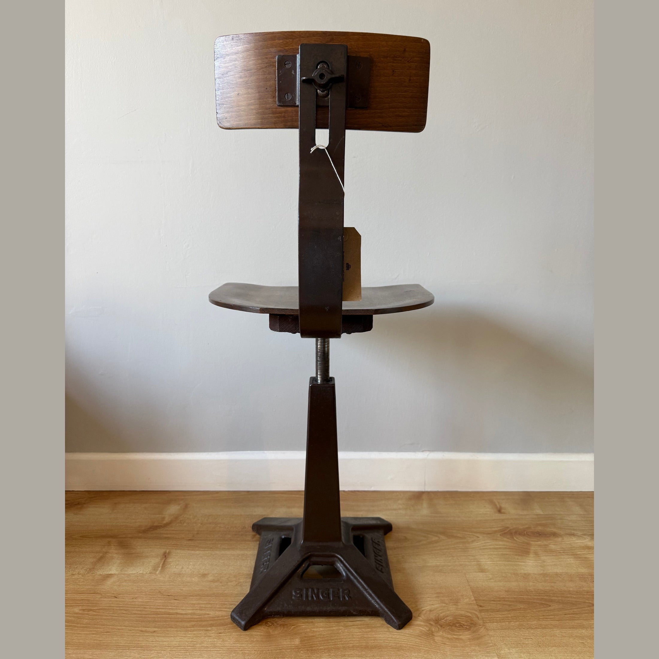 Vintage Singer chair with square base.