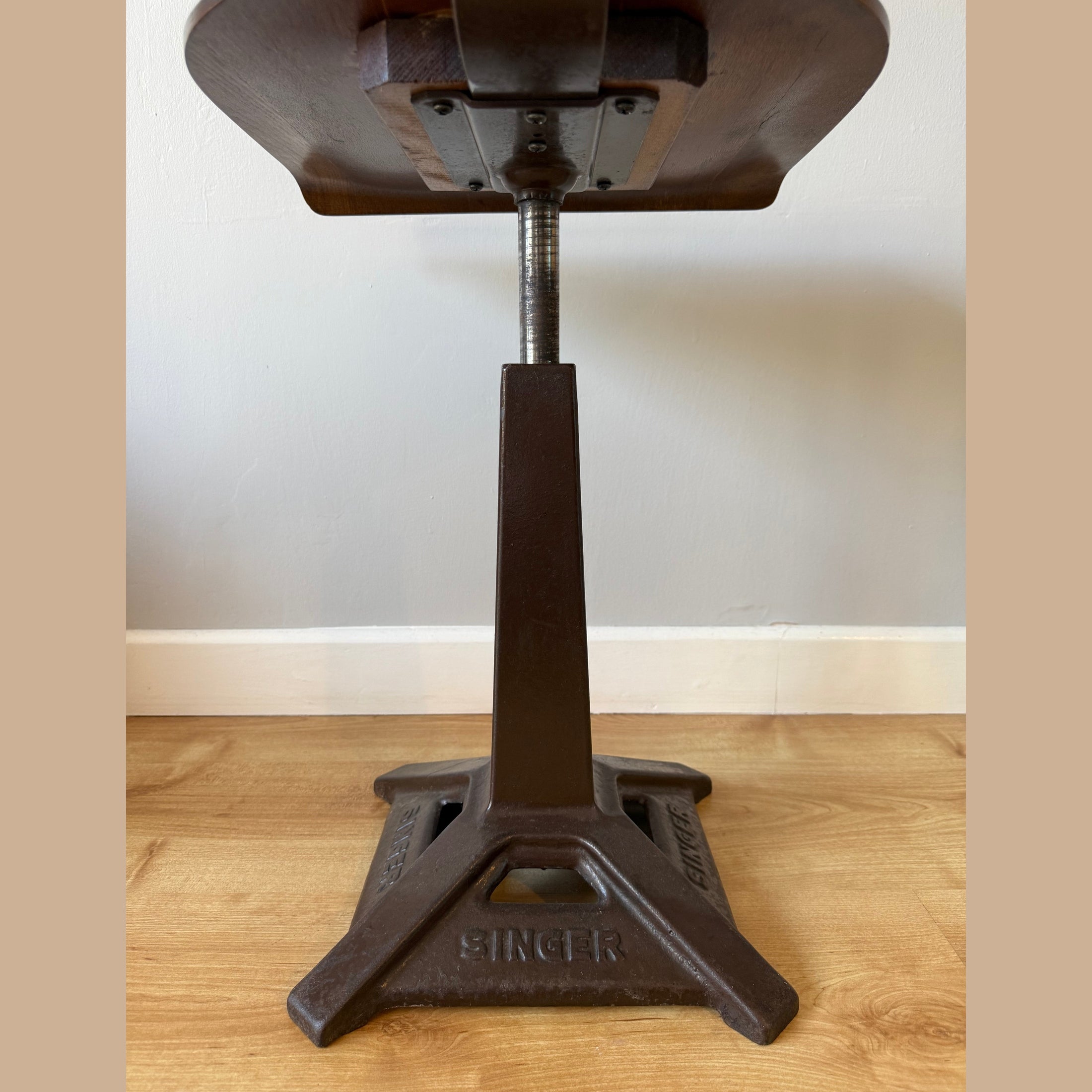 Vintage Singer chair with square base.