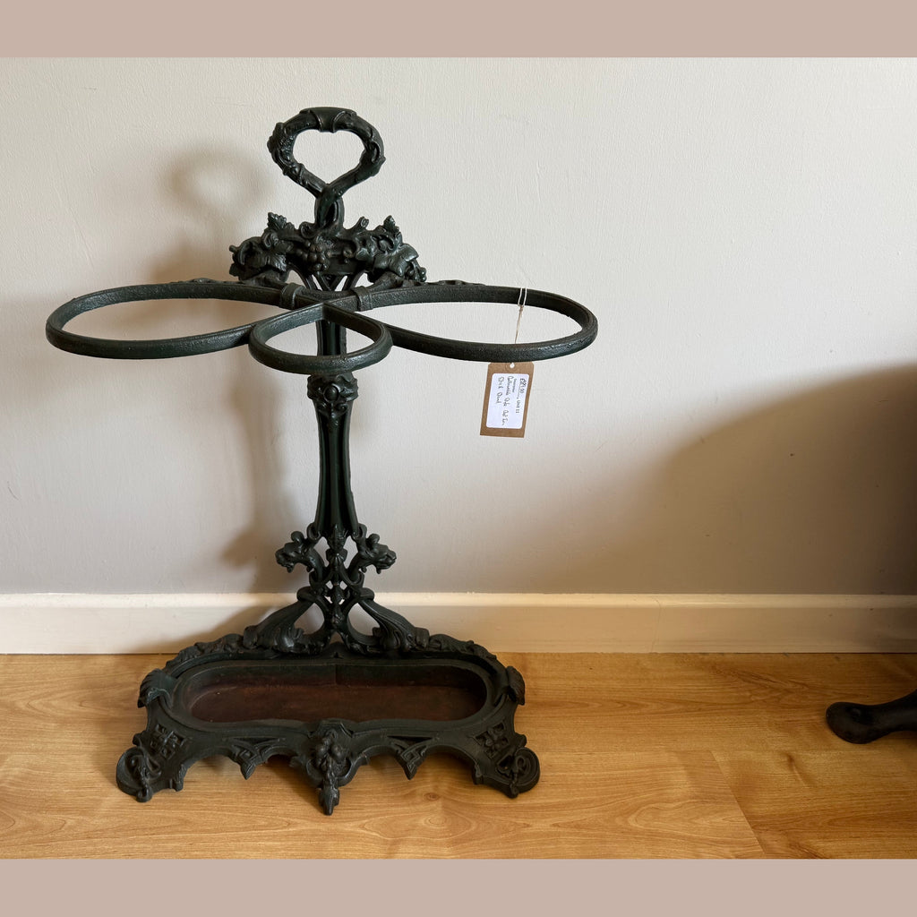 Angled view Victorian cast iron stick stand floral motifs grape cluster