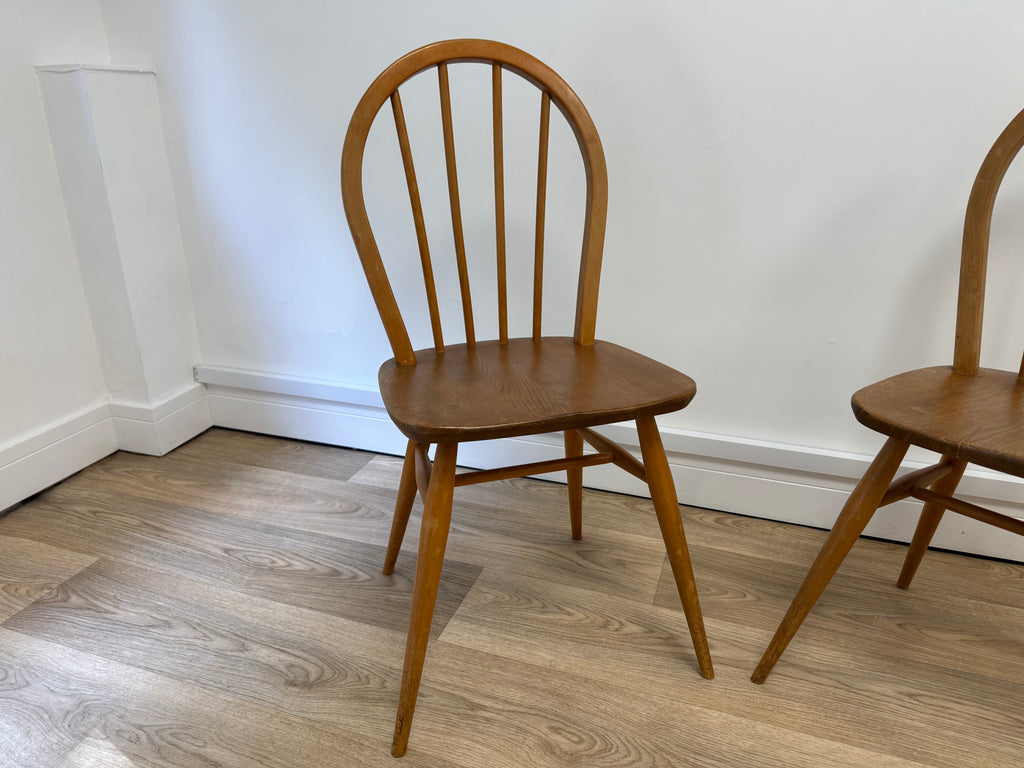 A pair of Vintage Ercol Model 400 dining chairs.