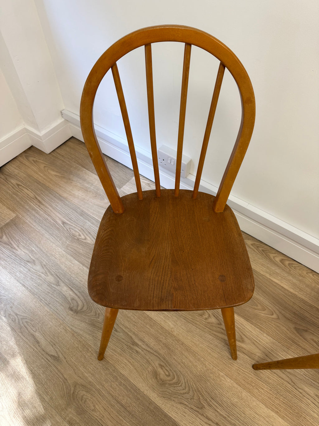 A pair of Vintage Ercol Model 400 dining chairs.