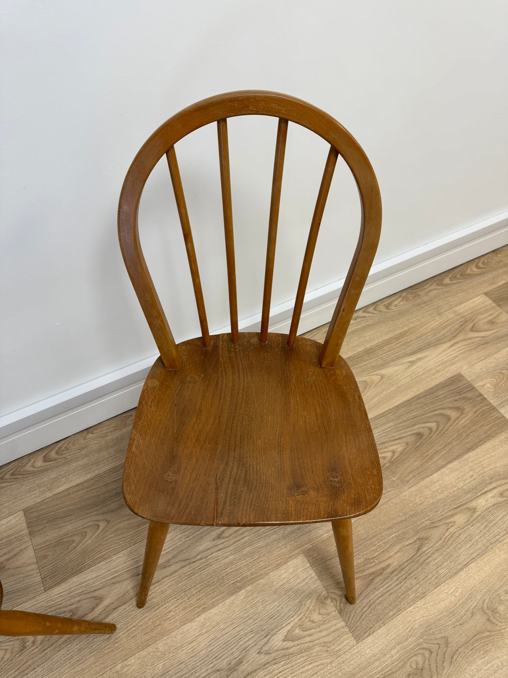 A pair of Vintage Ercol Model 400 dining chairs.