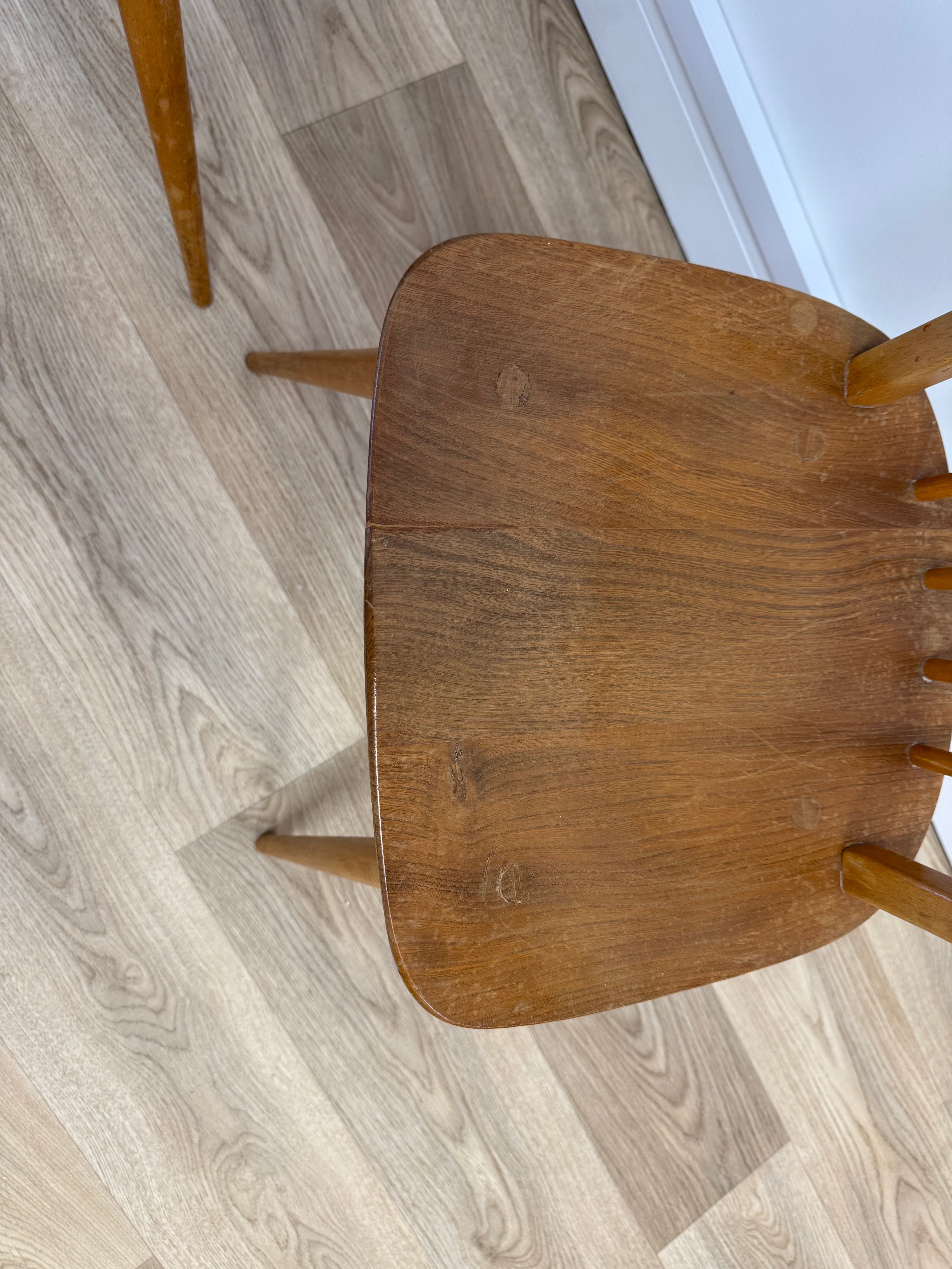 A pair of Vintage Ercol Model 400 dining chairs.
