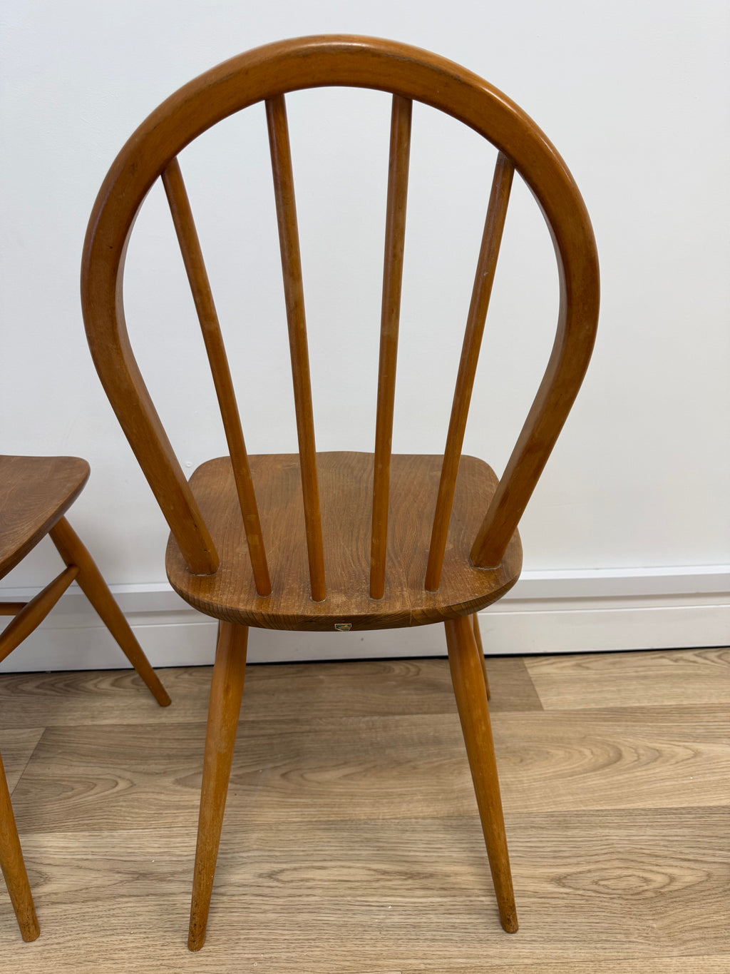 A pair of Vintage Ercol Model 400 dining chairs.